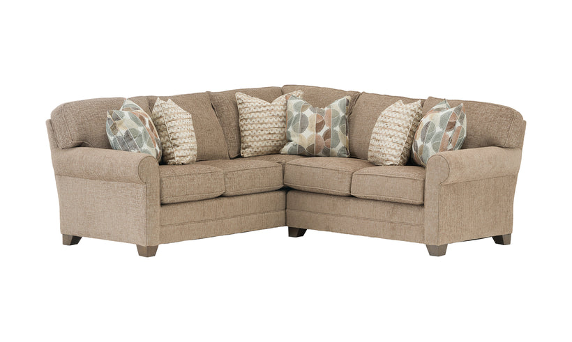Two piece sectional in a brown upholstery on a white background.
