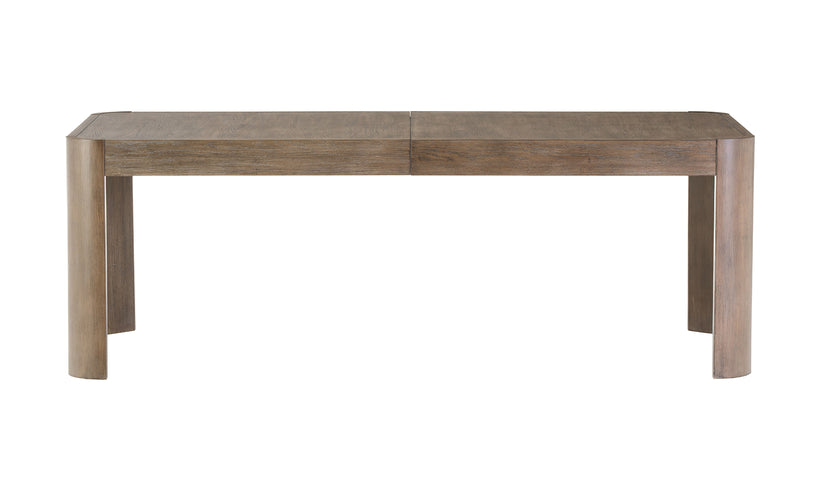 Rectangular dining table with rounded legs on a white background.
